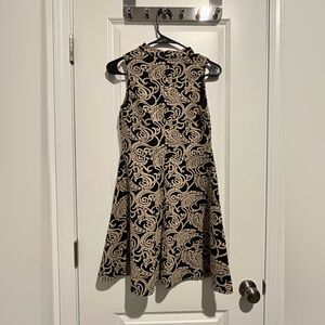 Elegant Black and Cream Patterned Dress